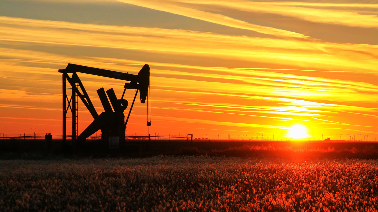 An oil pump at sunset